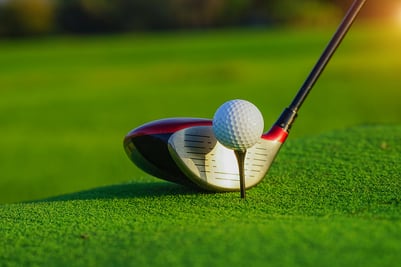 bigstock-Golf-Club-And-Ball-In-Grass-Co-407533862